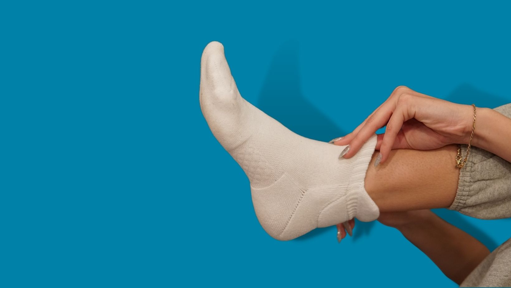 Woman wearing white padded socks prevent against blisters